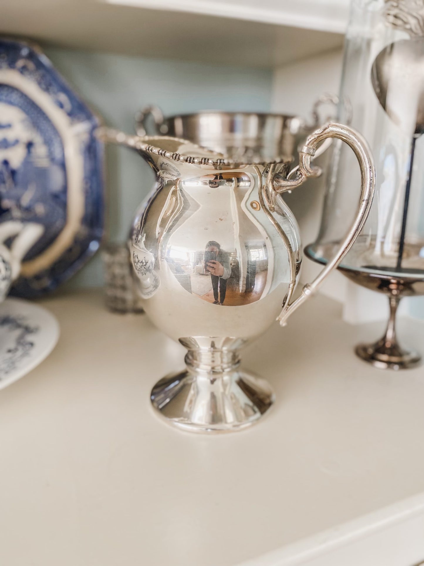 Elegant Antique Water Pitcher with Unique Shape