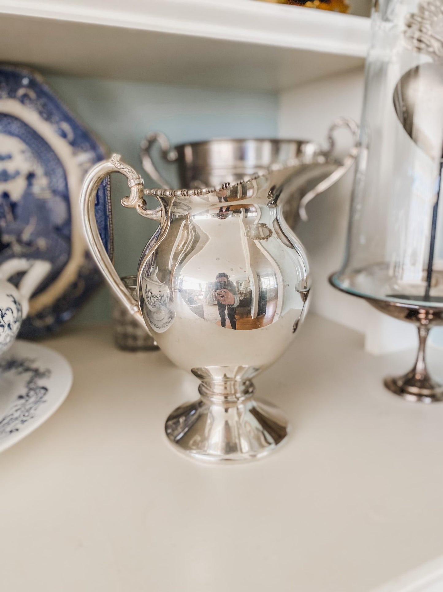 Elegant Antique Water Pitcher with Unique Shape