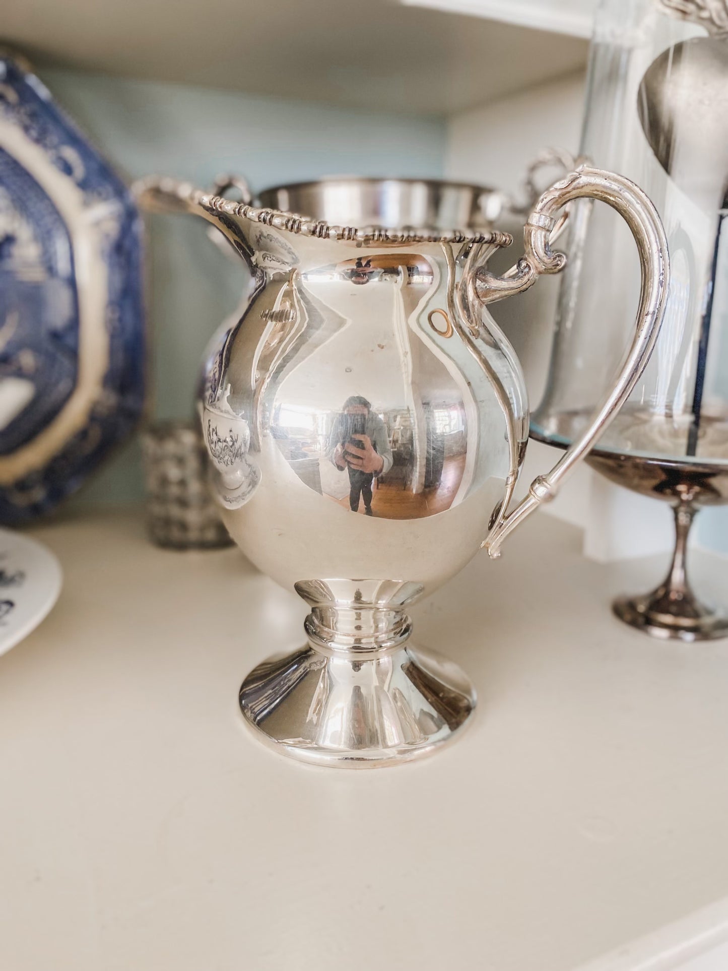 Elegant Antique Water Pitcher with Unique Shape